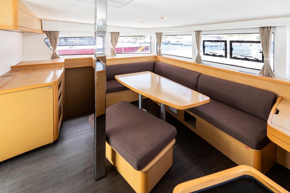 Saloon with dining table and panoramic windows