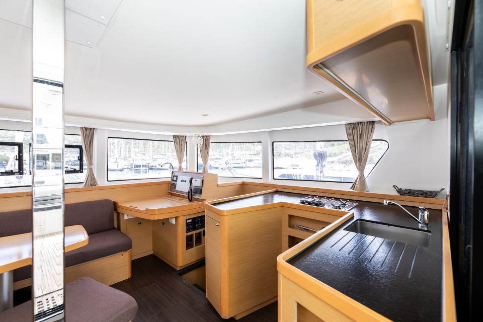 Galley with hob, oven and fridge