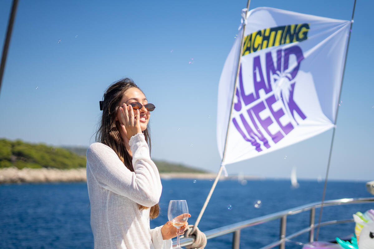 Go Yachting Island Week flag over the water