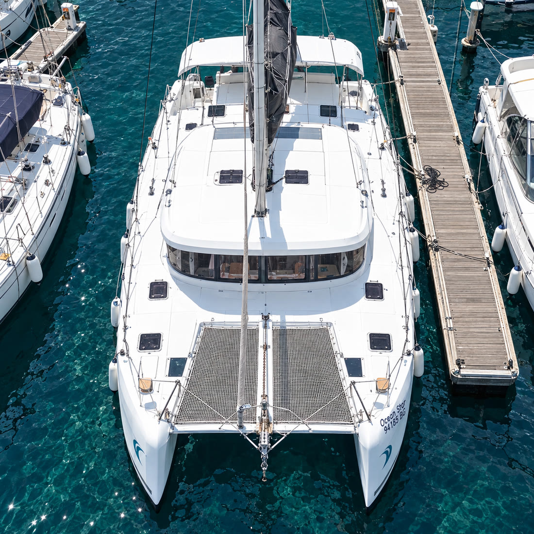 Catamaran moored in the marina, seen from above
